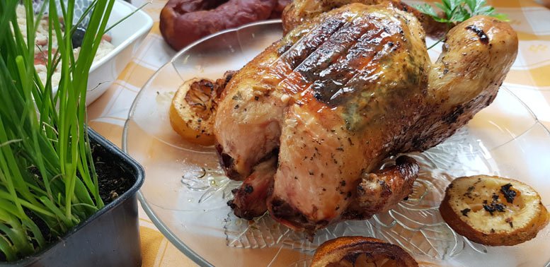 Frango assado com ervas aromáticas e arroz de miúdos