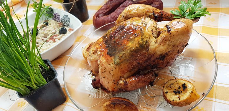 Frango assado com ervas aromáticas e arroz de miúdos